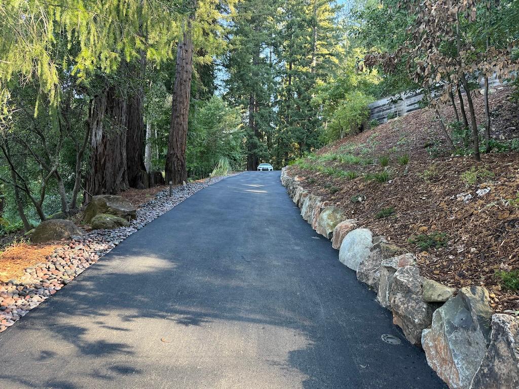 Soladano driveway boulders long view