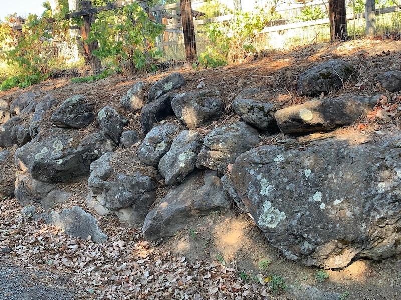 Boulder retaining wall